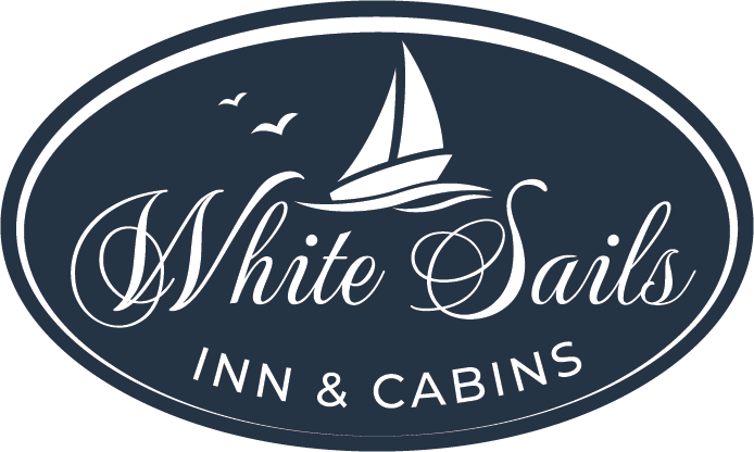White Sails Inn & Cabins logo